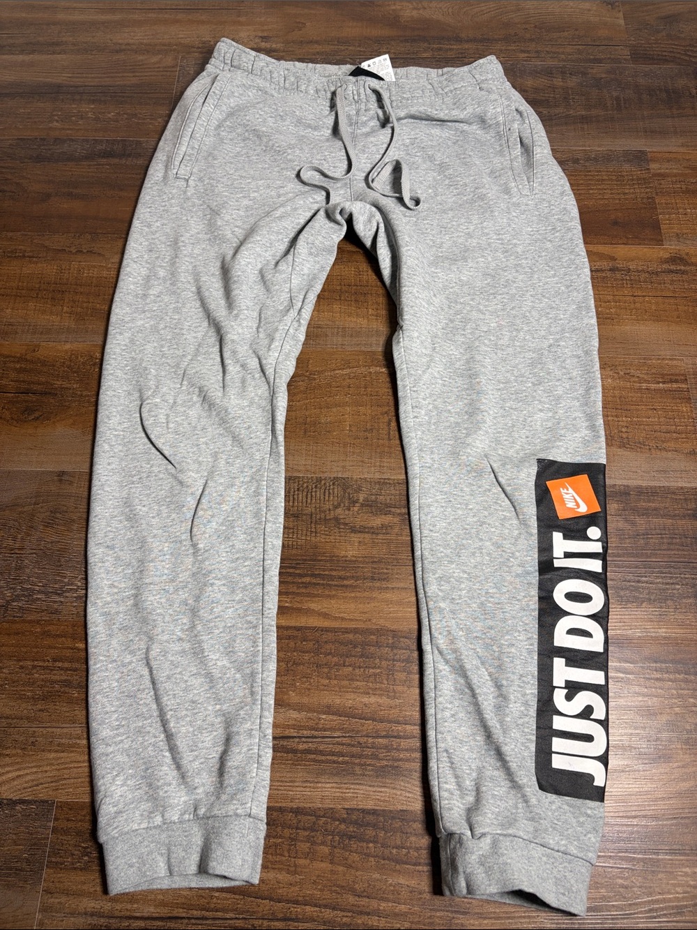 Nike Gray Sweatpants with Black & Orange 'JUST DO IT.' Panel